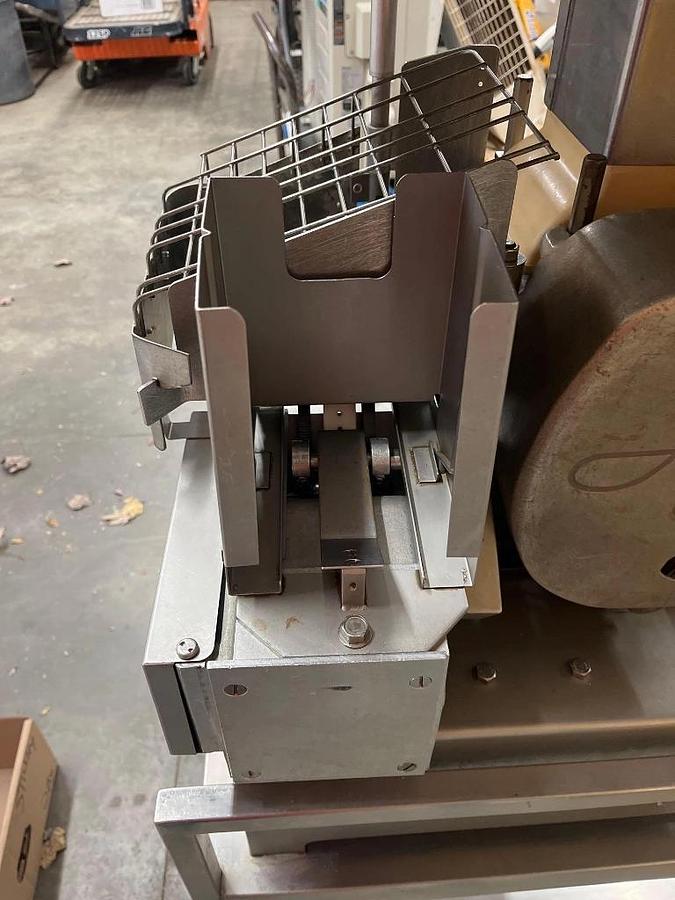 Used Hollymatic Super 54 patty machine with mold plates and accessories