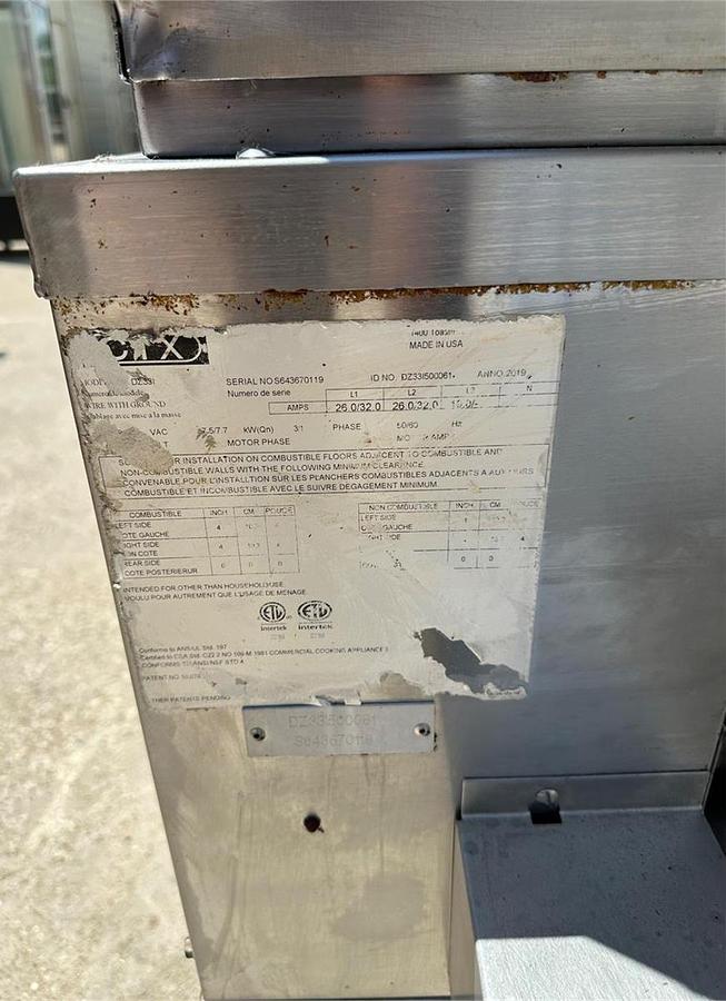 Used CTX Commercial conveyor oven on casters