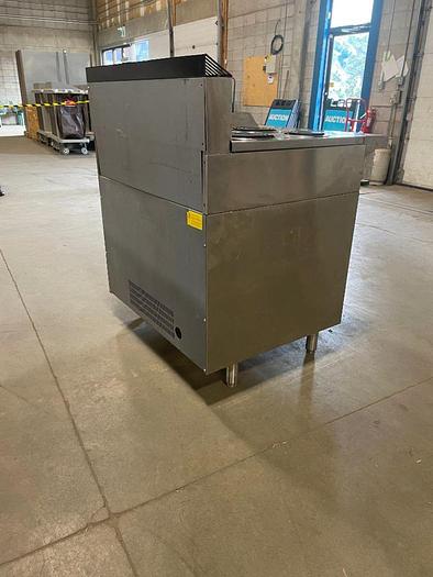 Refurbished Lot 126 GARLAND S686-12R ELECTRIC 4-BURNER RANGE WITH 12" GRIDDLE AND OVEN