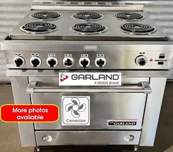 New Garland electric 6 burner range with convection oven below for