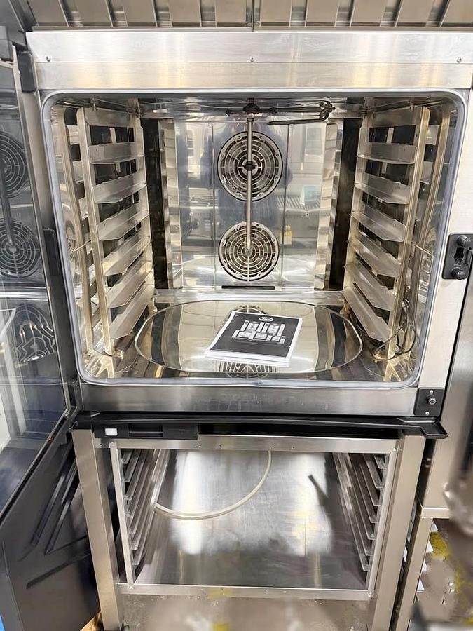 Used Unox full size electric combi oven with stand and hood