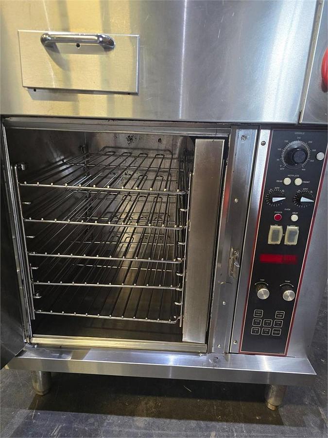 Used Wells Ventless cooking system - 2 burner with flat top grill and oven below