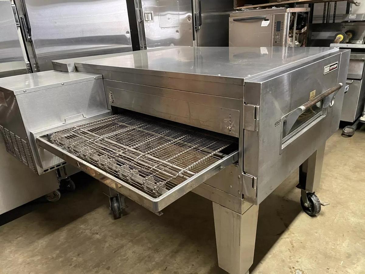 Used Lincoln Impinger 1600 - Single Deck 32" Gas Conveyor Pizza Oven w/Stand Casters