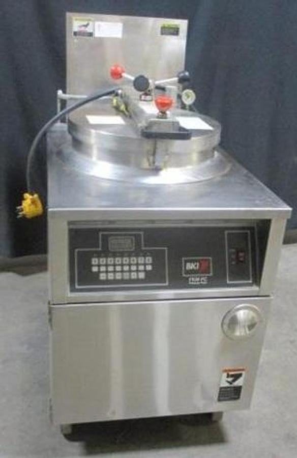 Used BKI 75lb Electric Pressure Fryer With Pull Out Grease Filter.