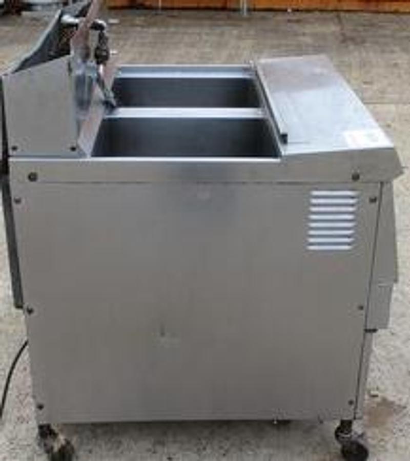 Used HENRY PENNY 2 BAY FRYER ON CASTERS