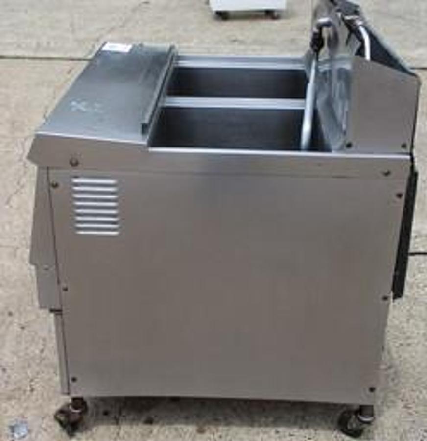 Used HENRY PENNY 2 BAY FRYER ON CASTERS