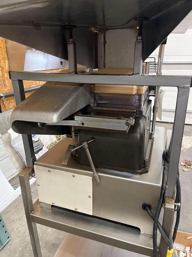 Used Hollymatic Super 54 patty machine with mold plates and accessories