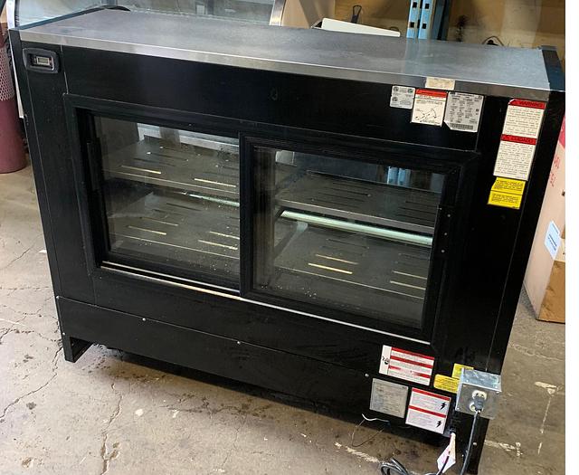 Used 57" WIDE TOR REY CURVED GLASS SHOWCASE