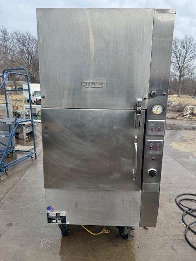 Used Ole Hickory Natural Gas Rotisserie Smoker On Casters.