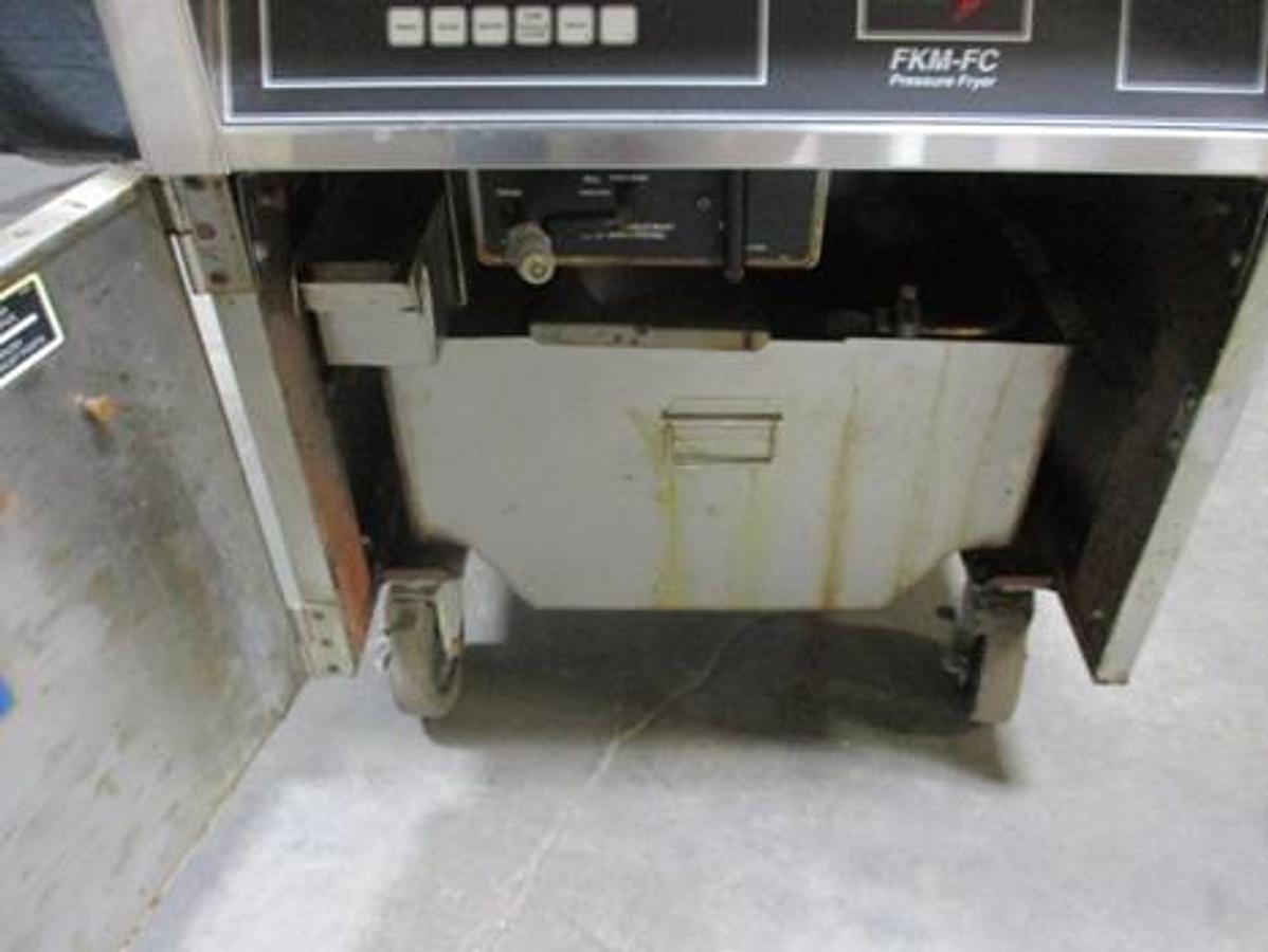 Used BKI 75lb Electric Pressure Fryer With Pull Out Grease Filter.