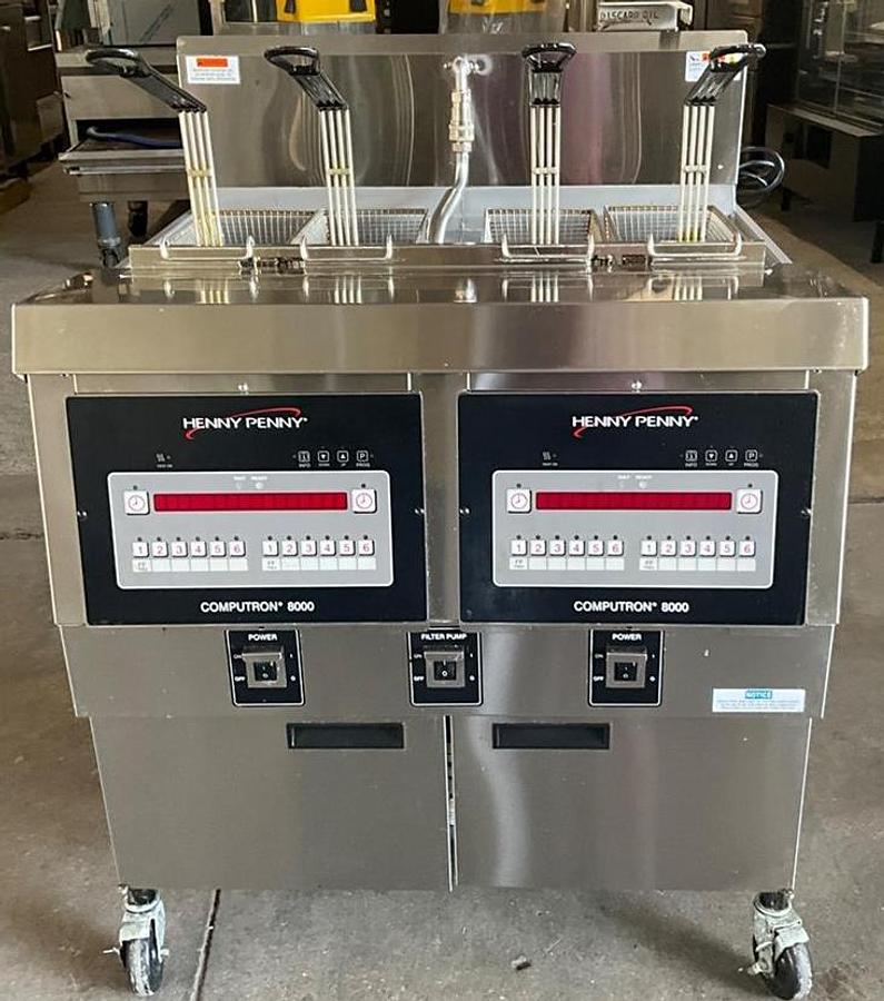 Used Henny Penny gas double fryer with built in filter