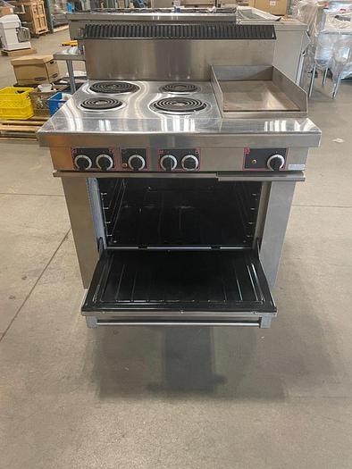 Refurbished Lot 126 GARLAND S686-12R ELECTRIC 4-BURNER RANGE WITH 12" GRIDDLE AND OVEN