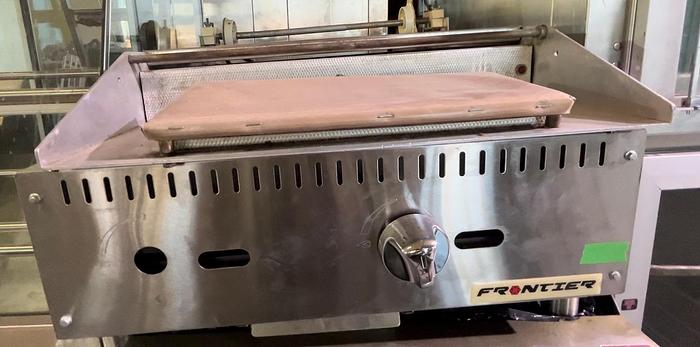 Used Frontier Shrink Wrap Over Counter