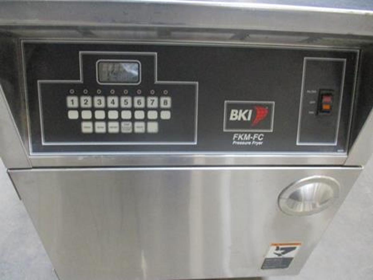 Used BKI 75lb Electric Pressure Fryer With Pull Out Grease Filter.