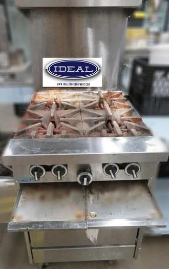 Used Garland Gas 4 burner range with oven