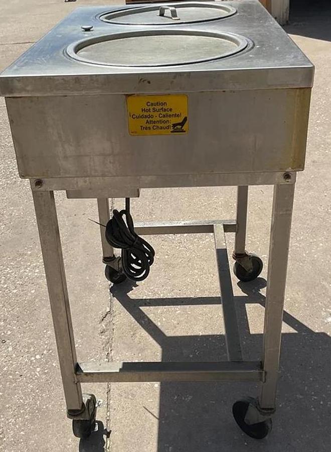 Used Belshaw icing warmer on Casters