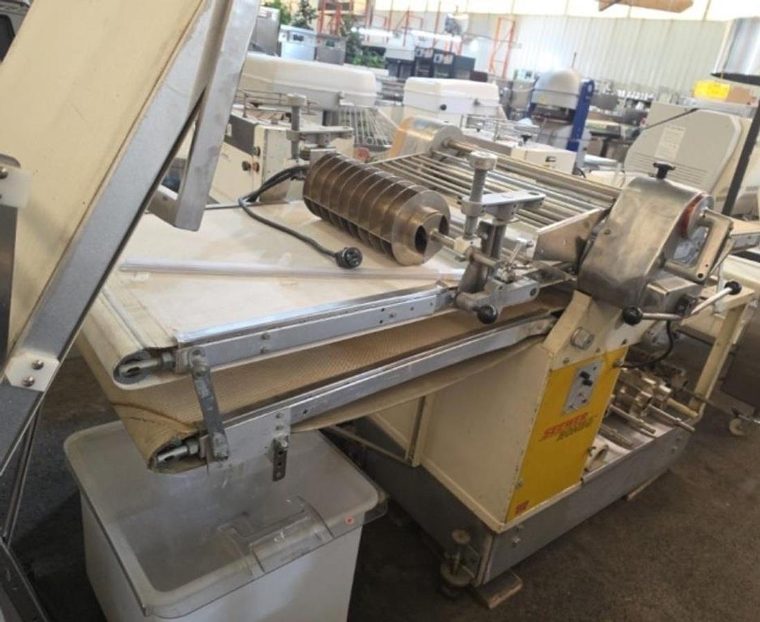 Used 89 in Seewer rondo sheeter with many different cutter heads