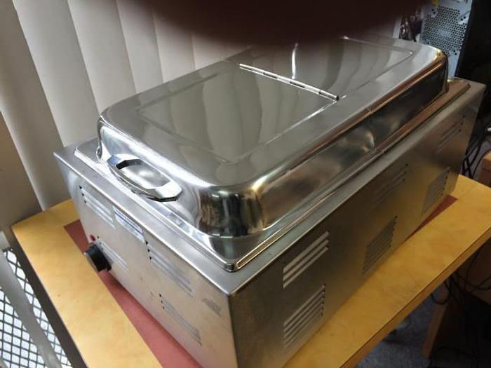 Hot dog steamer with bun warmer and hinged top lid