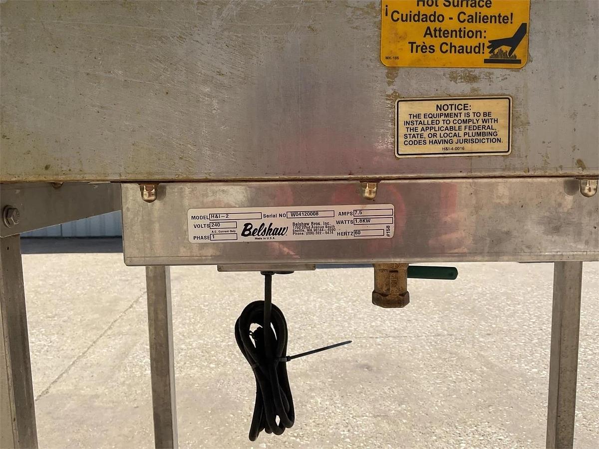 Used Belshaw icing warmer on Casters