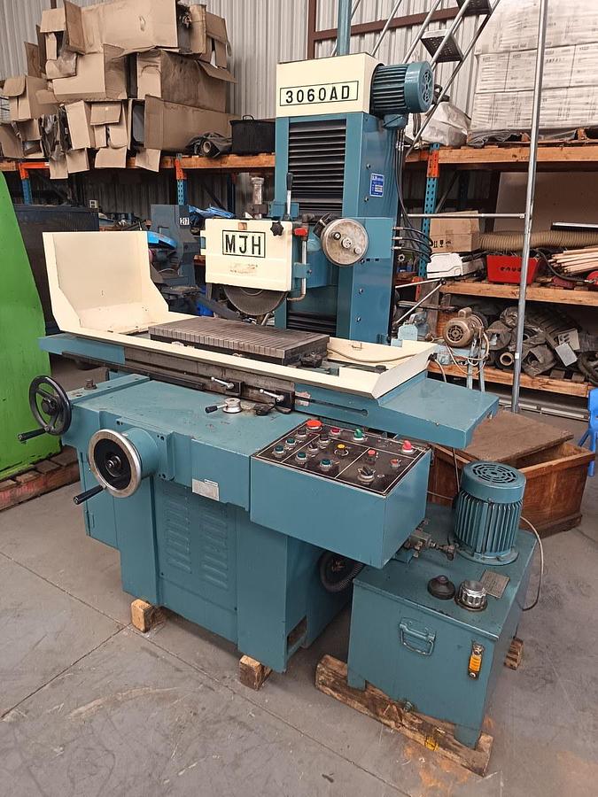 Used MJH hydraulic surface grinder - as new