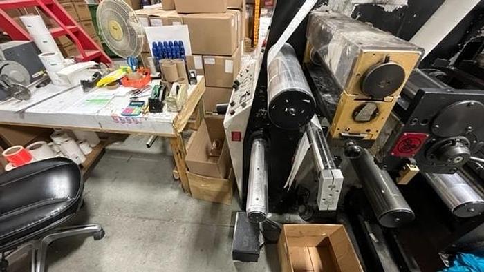 Used 13" WIDE ROTOFLEX SLITTER REWINDER WITH 2 STATION DIE CUTTING