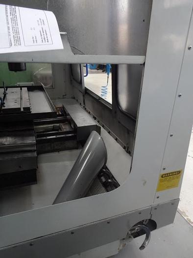 Utilisé Centre d’usinage vertical 3 axes Marque MIKRON – HAAS