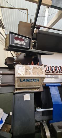 Maquina revisar enrrollar empaquetar 