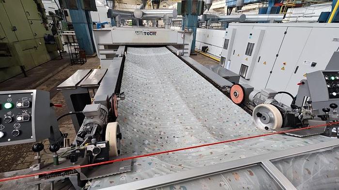 Detailed view of pin chain system on UNITECH Stenter EVO RED8, 2019