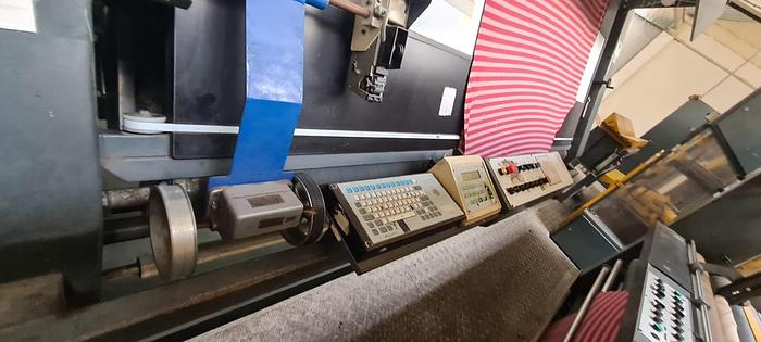 Maquina revisar enrrollar empaquetar 