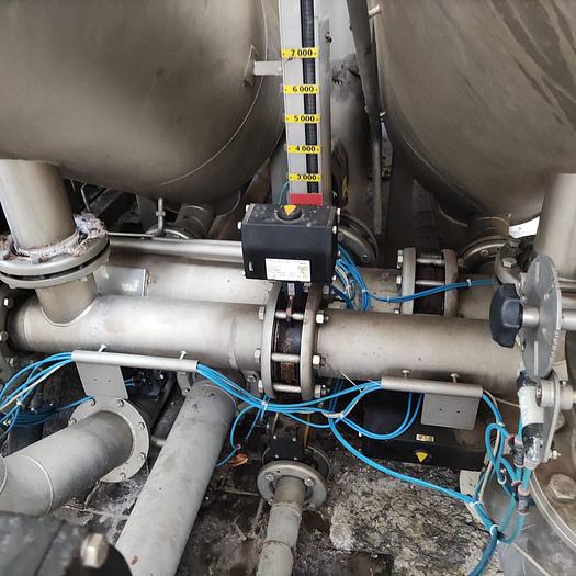 Control valves on THIES JET TRD dyeing machine, ensuring precise flow regulation during textile dyeing