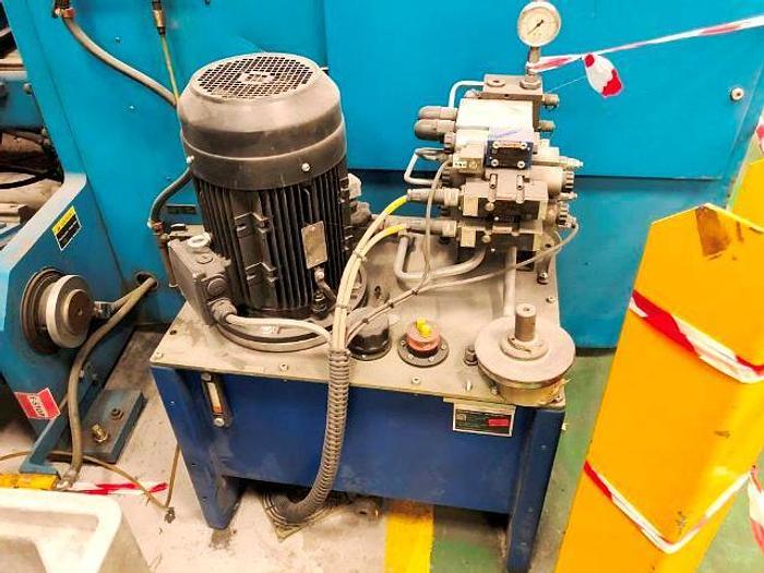 Used 141" DUSENBERY DUPLEX CENTER SURFACE SLITTER REWINDER