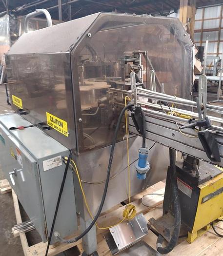 Used TRine 4500 roll fed labeler - hot melt