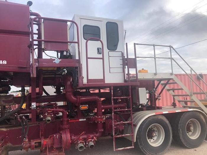 Used 2010 Stewart and Stevenson Single Pump trailer with mixing system.