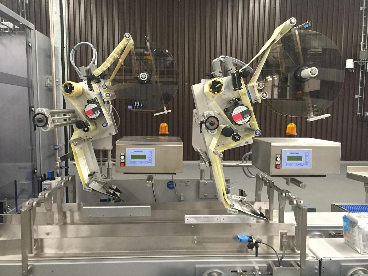 Used - CMB 600 Shrink Wrapping Machine and StraPack RQ-8X Automatic Strapping Machine for Sale