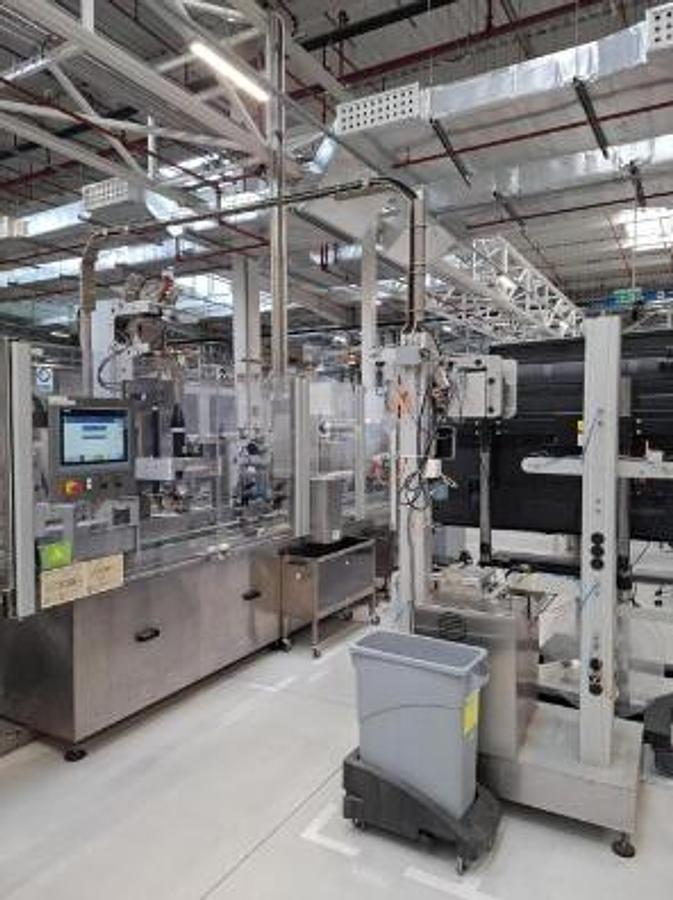 Used Bottle Distribution and Sleeve-Wrapping Line