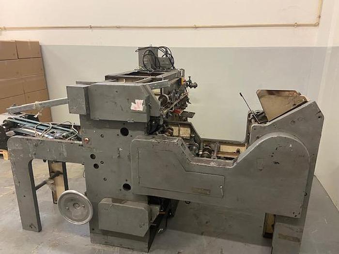 Used (visible in production) 1989 WINDMÖLLER & HÖLSCHER (W&H) T1441 - For making and attaching flat  handles to paper bags
