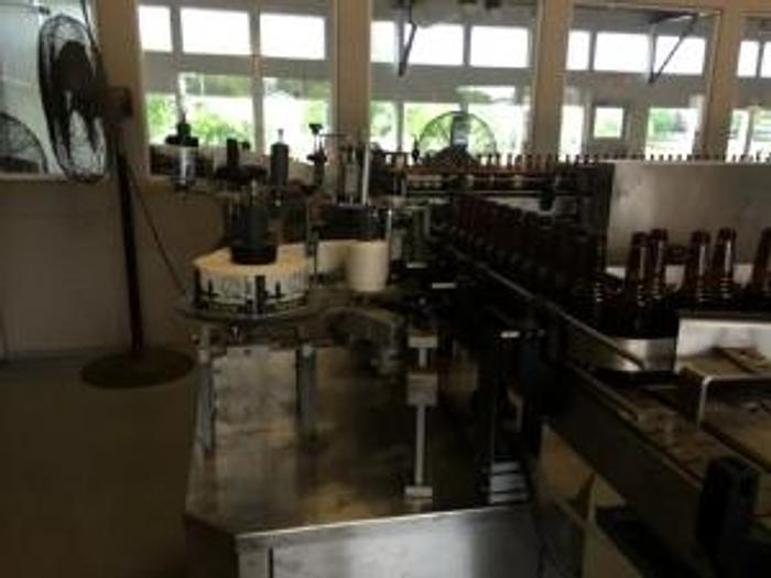 Used Bertolasso 12 Valve Bottling Line
