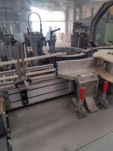 Used TRine 4500 roll fed labeler - hot melt