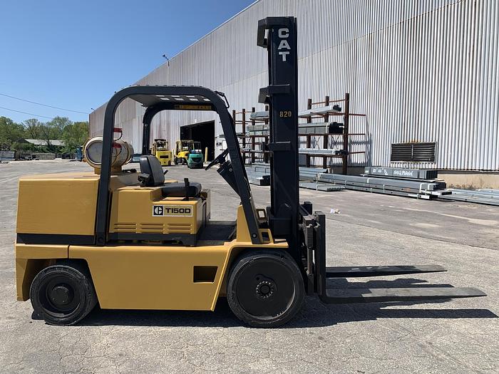 Used 15,000 LB CATERPILLAR MODEL T150D FORKLIFT W/ SIDE SHIFT