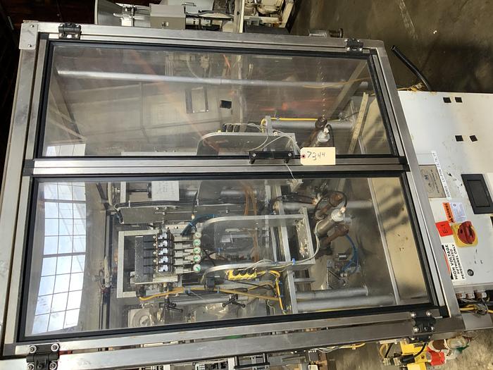New England Machine Dual Head Capper