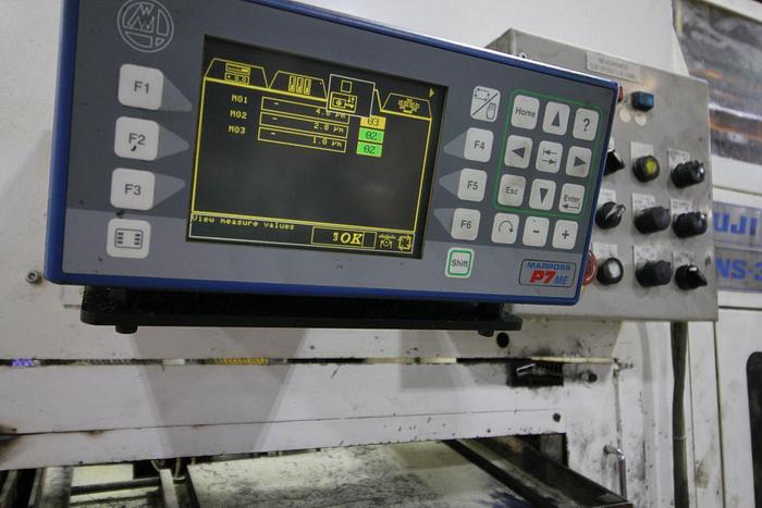 Used FUJI ANS-320TTS TWIN TURRET CNC LATHE WITH ROBOT LOAD/UNLOAD AND STOCKER TABLES