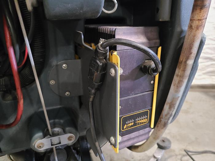 Used Convertamatic Floor Scrubber (A) with Built-in Charger.