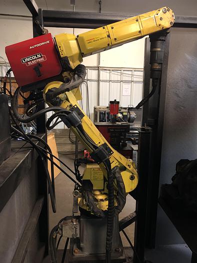 Used FANUC ARCMATE 100iC MIG WELDING CELL WITH A/B SIDED TABLE AND SERVO DRIVEN ROTARY TABLE ON EACH SIDE