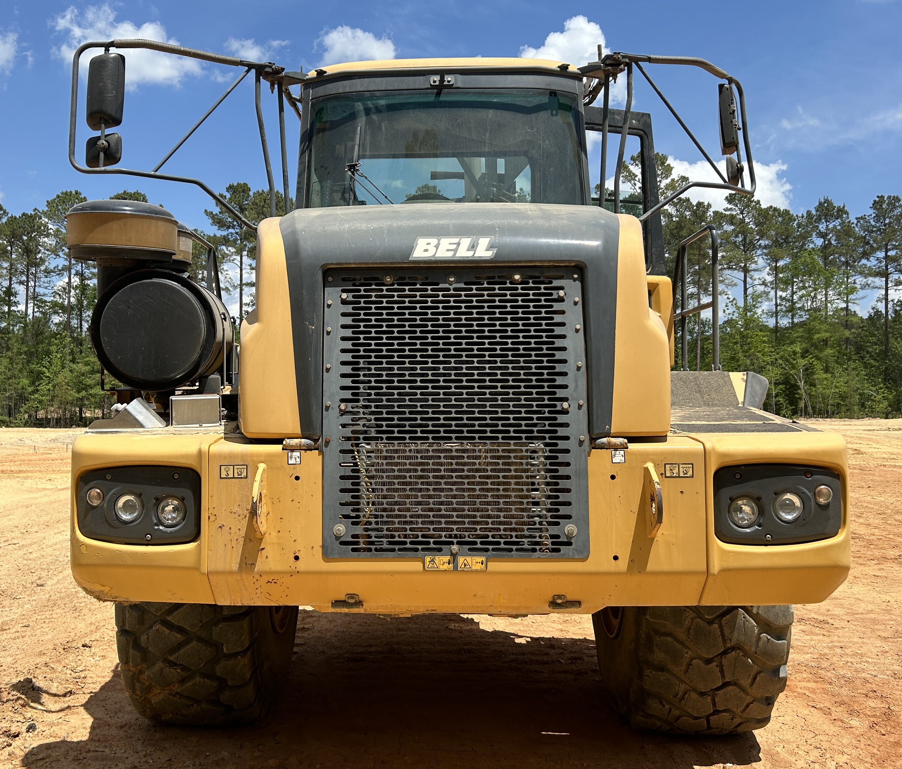 Used 2016 K-Tec K-Tec 1233 ADT scraper pulled by 2016 Bell B40D articulated dump truck