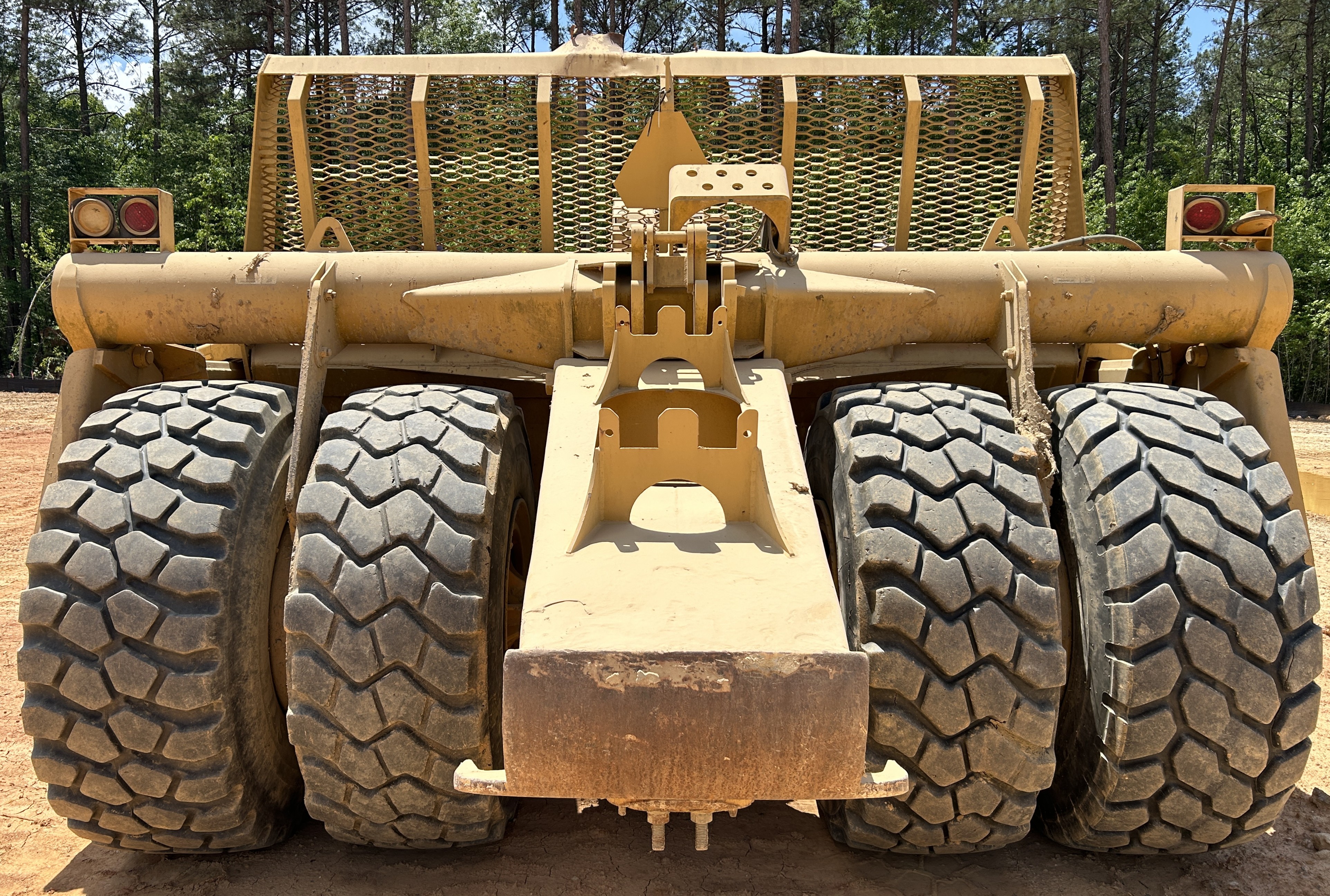 Used 2016 K-Tec K-Tec 1233 ADT scraper pulled by 2016 Bell B40D articulated dump truck