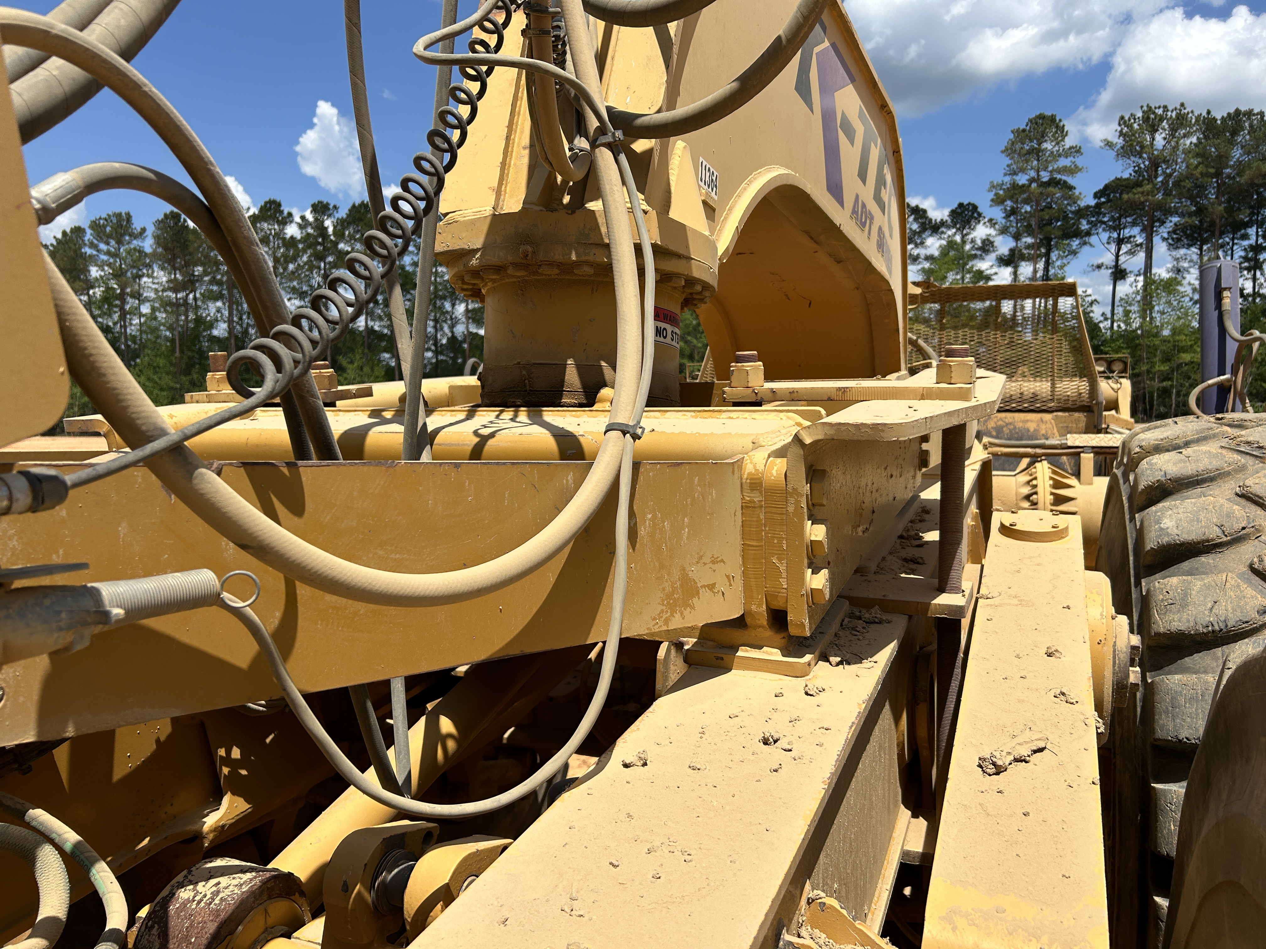 Used 2016 K-Tec K-Tec 1233 ADT scraper pulled by 2016 Bell B40D articulated dump truck