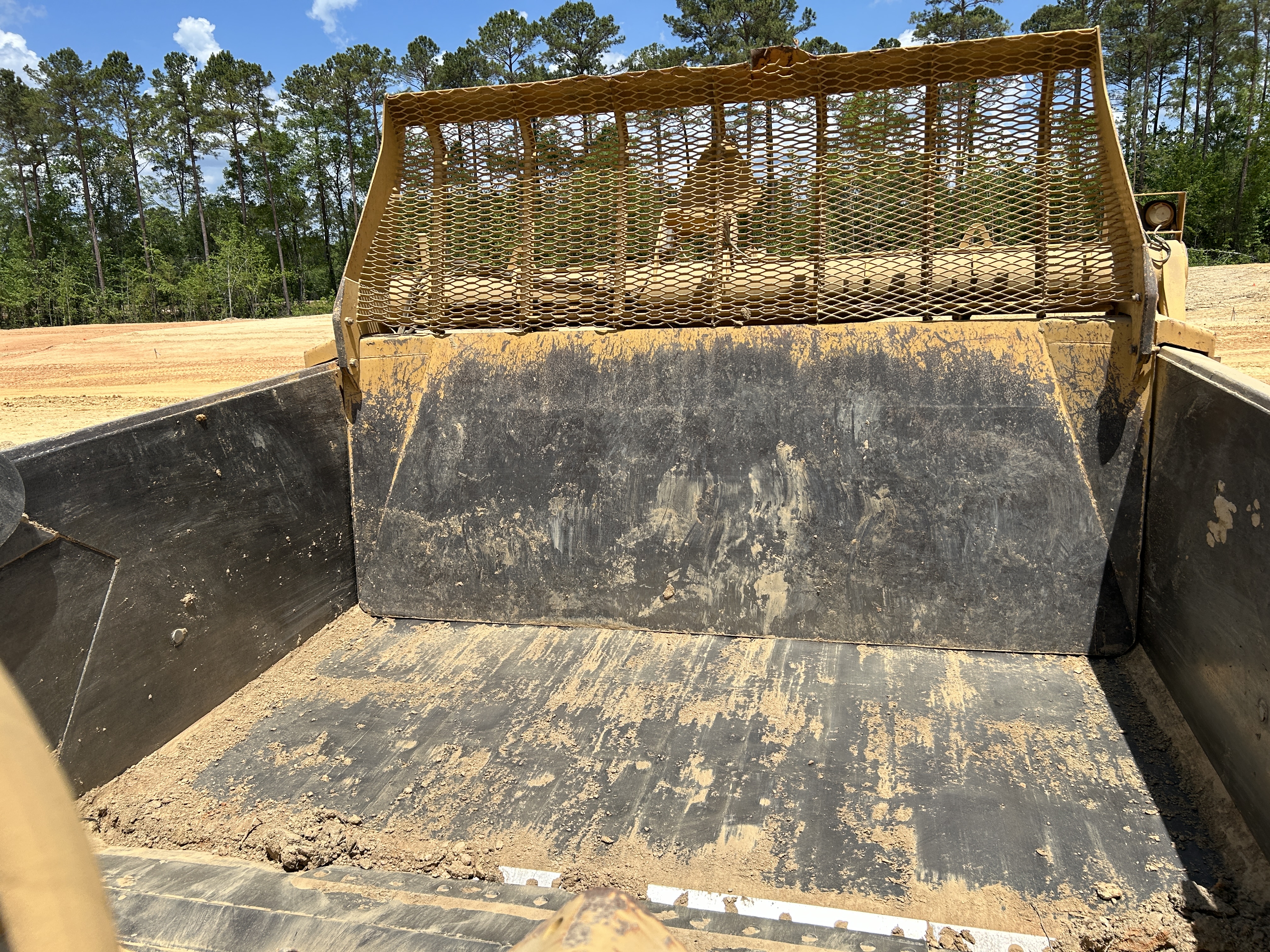 Used 2016 K-Tec K-Tec 1233 ADT scraper pulled by 2016 Bell B40D articulated dump truck