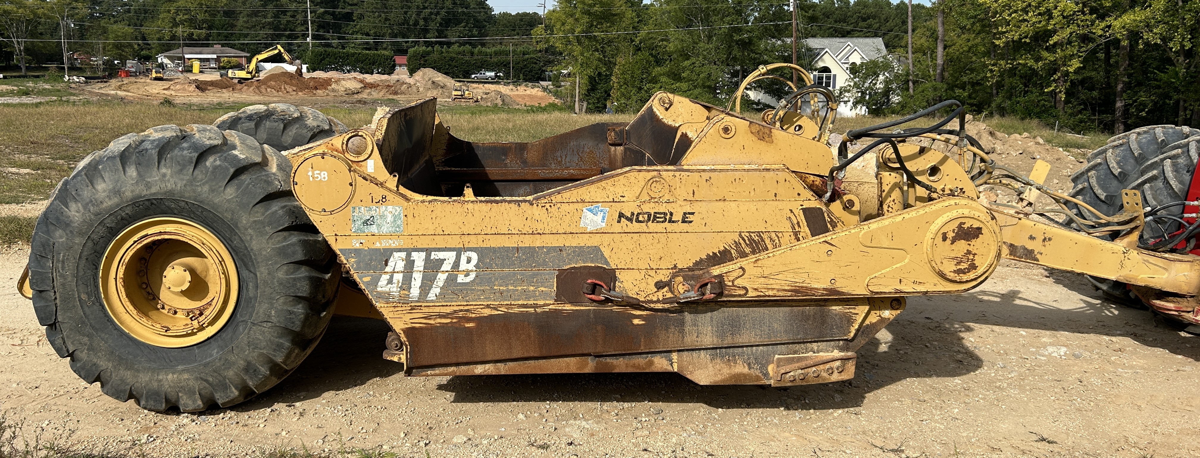 Used 2004 Case STX450 with 17 yard Noble Pull pan