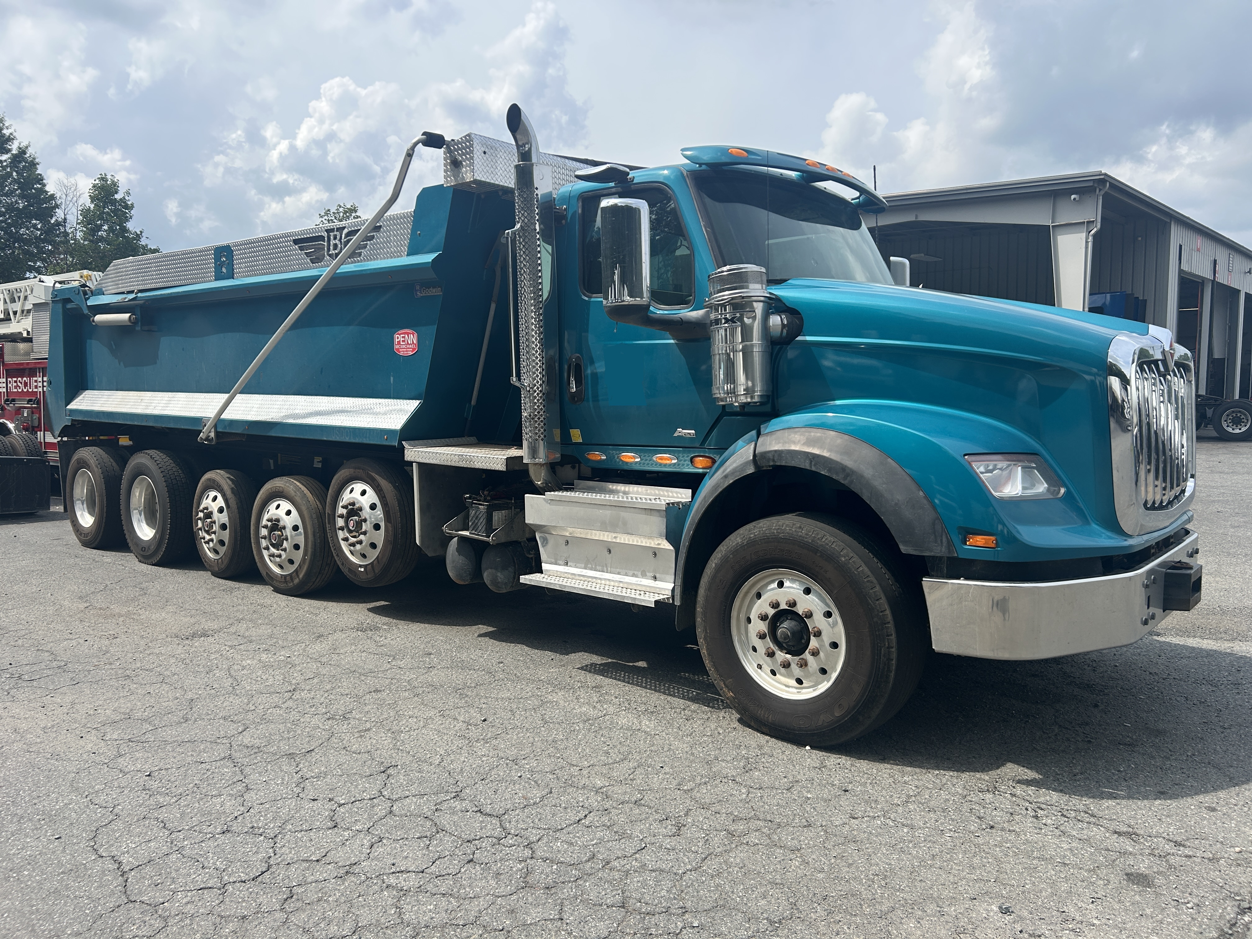 Used 2023 International HX620 Servere Duty Quint Axle Dump Truck