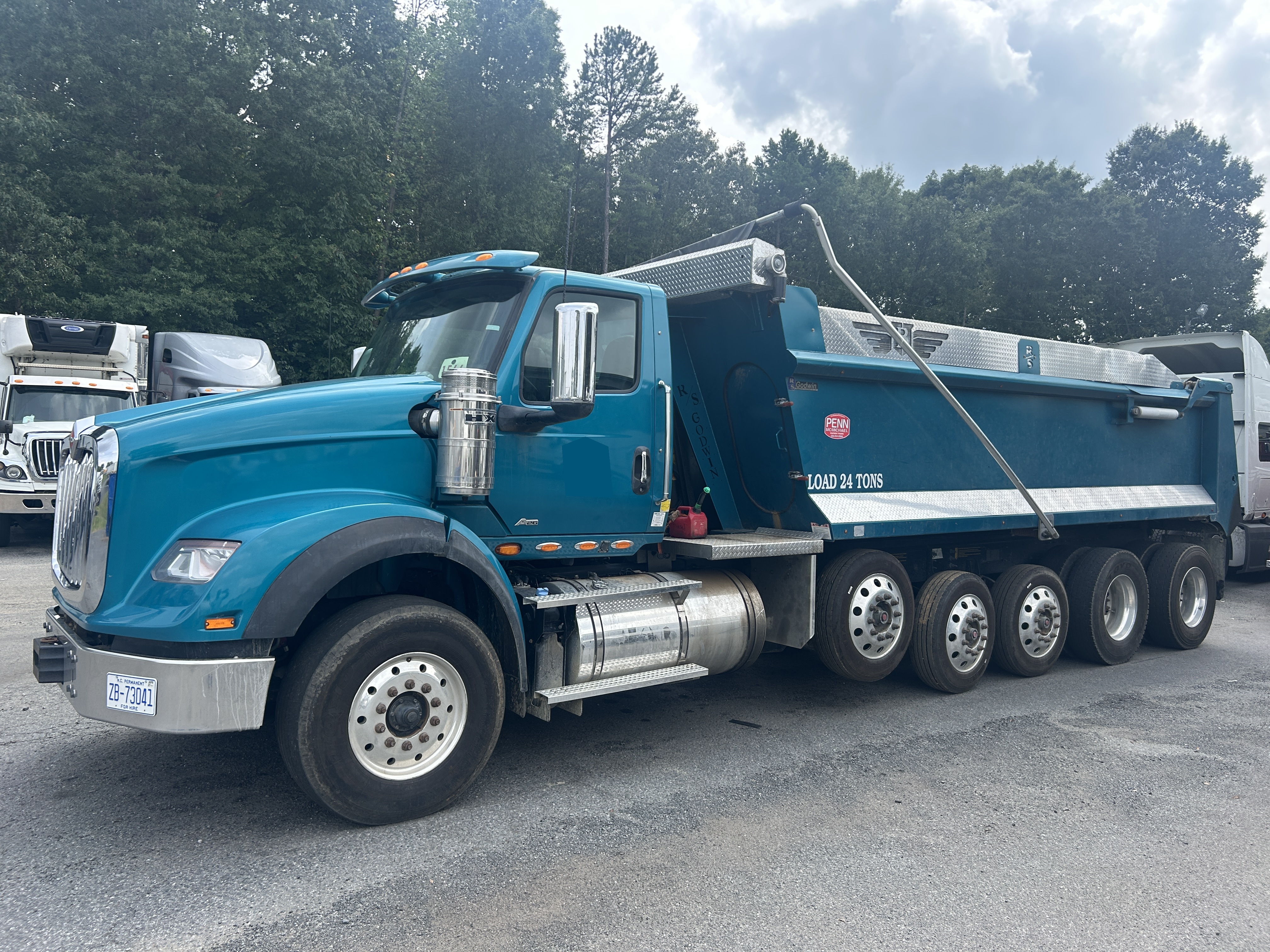 Used 2023 International HX620 Servere Duty Quint Axle Dump Truck